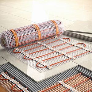 a Underfloor heating mat rolled up and ready to install under floor tiles